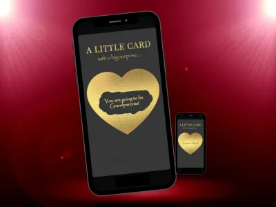 A Little Card with a Big Surprise digital scratch card on a phone: a gold heart revealing You are going to be Grandparents, with a smaller phone on a red spotlight stage