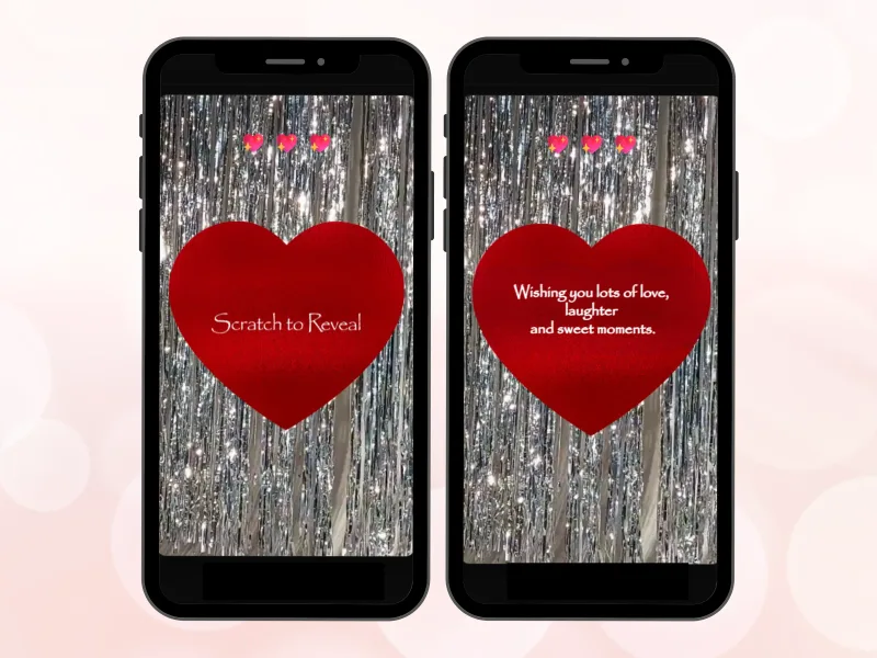 Silver tinsel love scratch card on two phones, red heart scratched to reveal a message wishing love, laughter and sweet moments